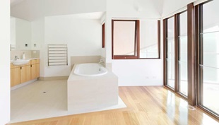 The vaulted ceiling of the ensuite bathroom.